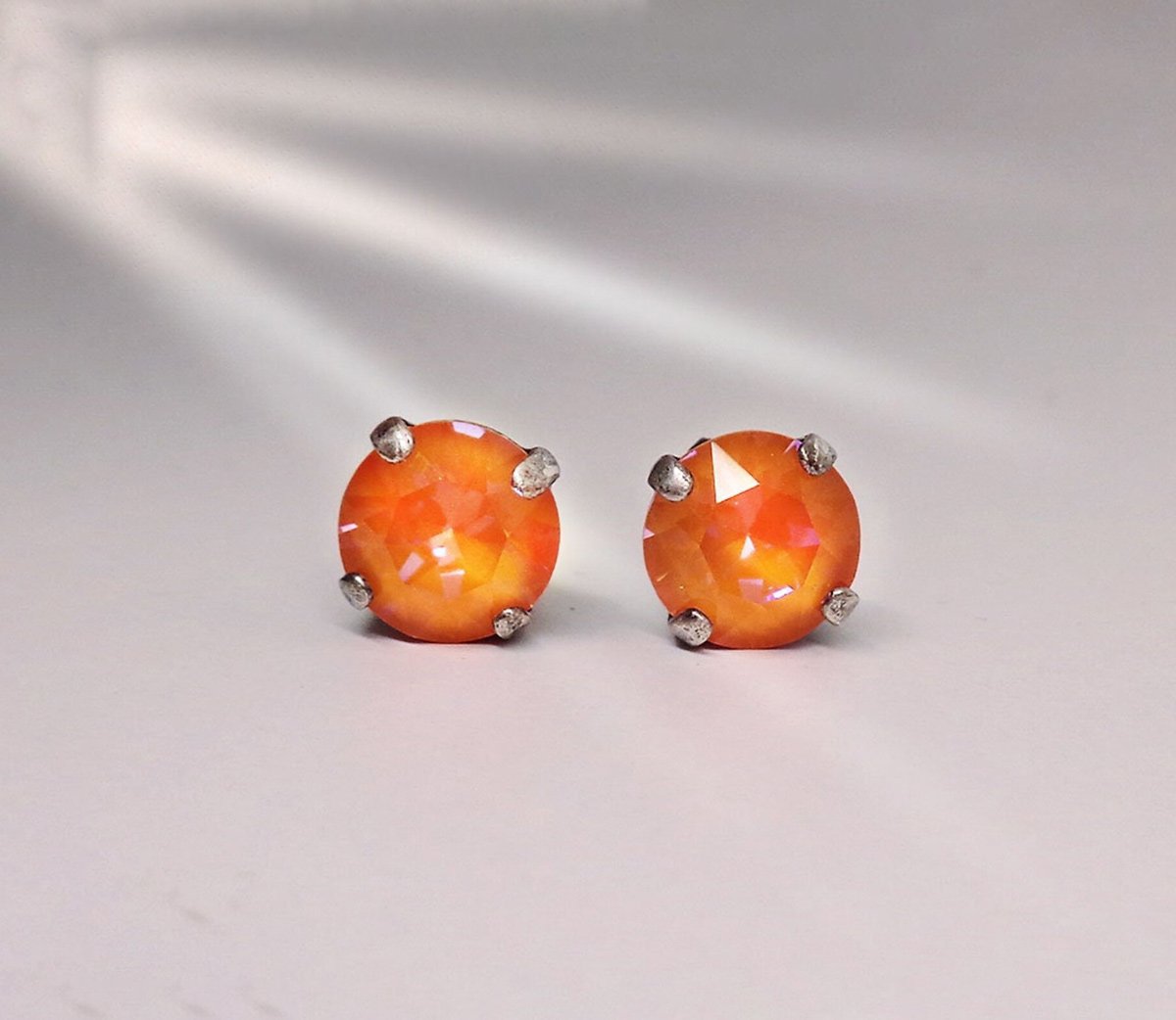 Crystal stud earrings orange glow delite,antique silver